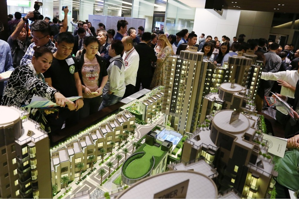 Potential buyers visit the sales office for a residential development in Kwun Tong. Photo: Jonathan Wong