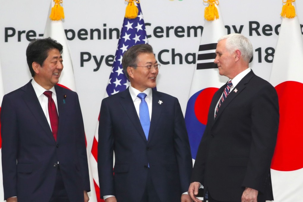 South Korea's President Moon Jae-in (centre) poses with United States Vice-President Mike Pence and Japan's Prime Minister Shinzo Abe. Photo: AFP
