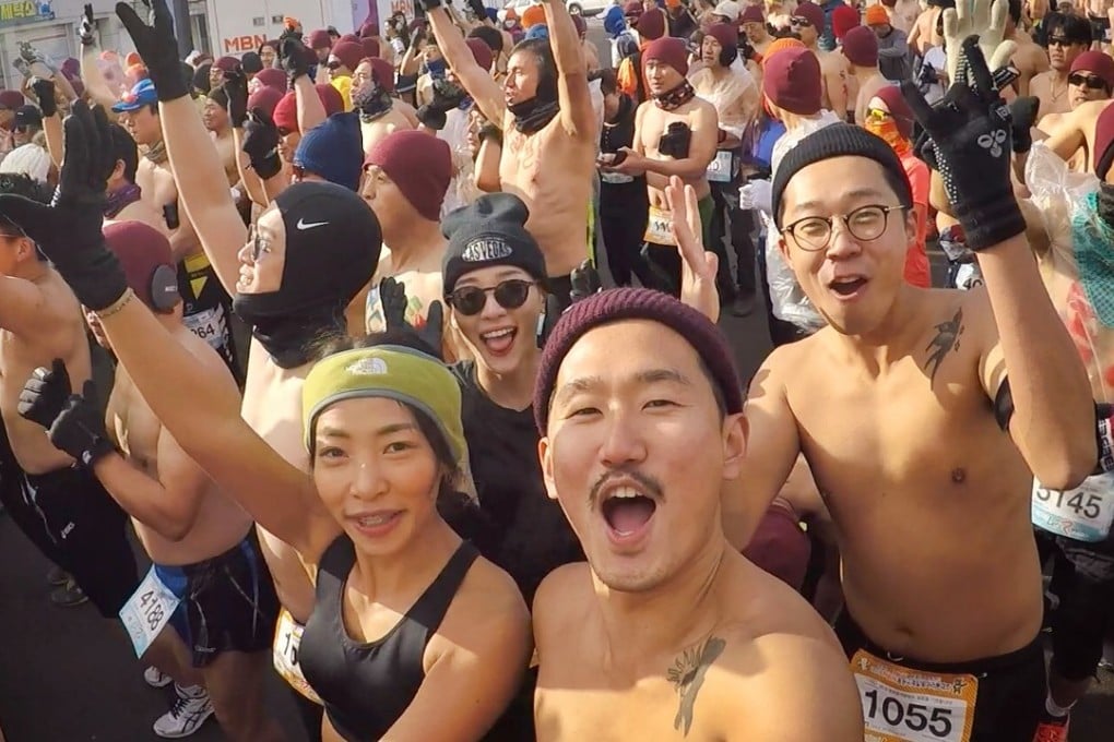 Competitors including the ‘Three Idiot Boys’ (front) take to the freezing Pyeongchang streets for the ‘Naked Marathon’. Photos: Handout