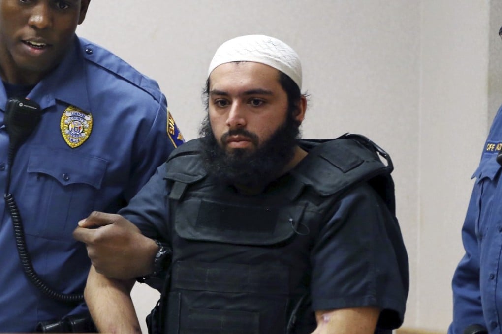 In this file photo on December 20, 2016, Ahmad Khan Rahimi, the man who set off bombs in New Jersey and New York, is led into court in Elizabeth, New Jersey. He is expected to be sentenced to life in prison on February 13, 2018. Photo: AP