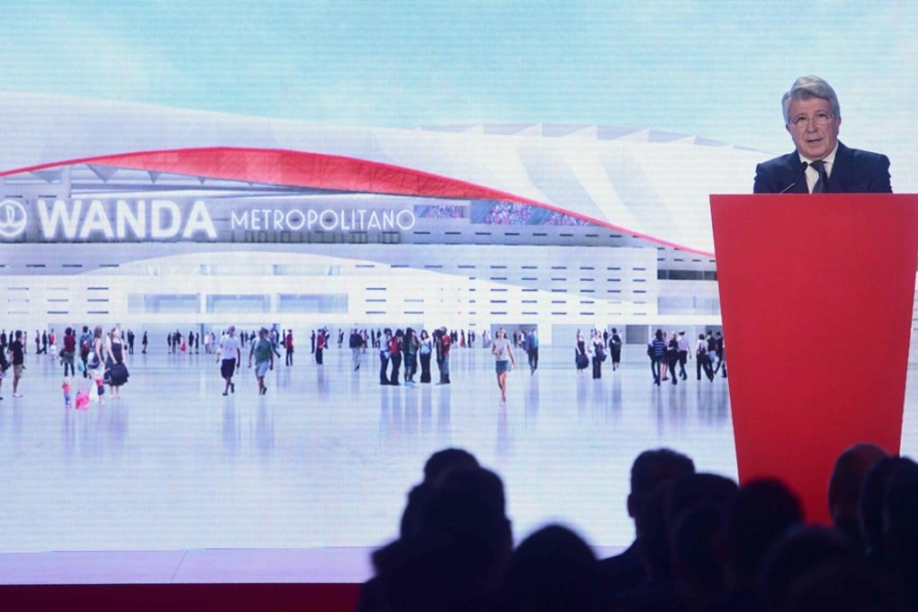 Atletico Madrid president Enrique Cerezo announces the name of their new stadium, Wanda Metropolitano, in Madrid on December 9, 2016, after Wanda Group won the naming rights. Photo:AFP