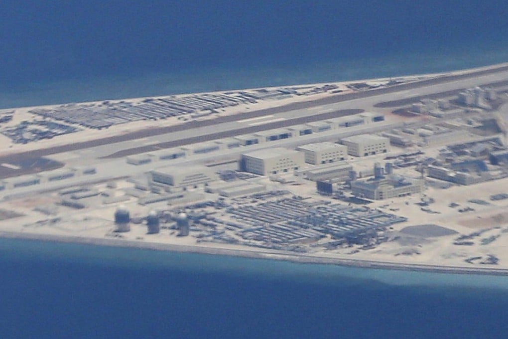An airstrip, structures and buildings are seen in this file photo of China’s man-made Subi Reef in the Spratly Islands in the South China Sea. A US naval commander said Beijing has built seven military bases in the disputed waterway. Photo: AP