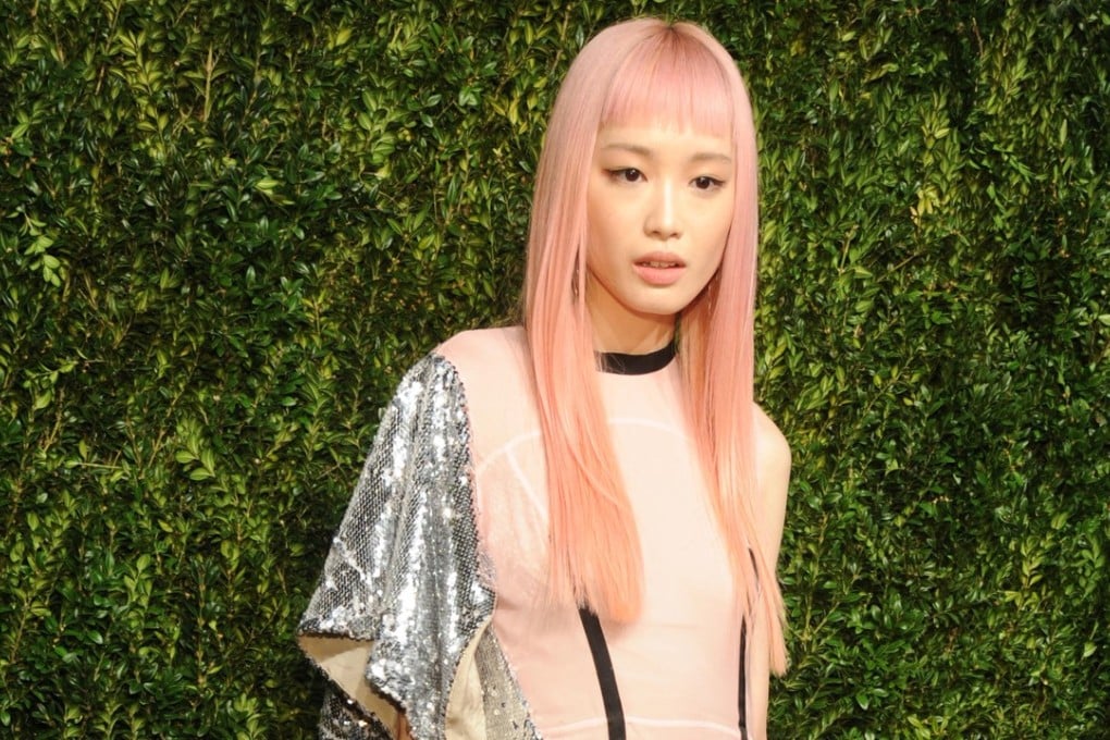 Fernanda Ly poses for photographers at the 14th Annual CFDA/Vogue Fashion Fund Gala in New York in November 2017. Photo: Alamy