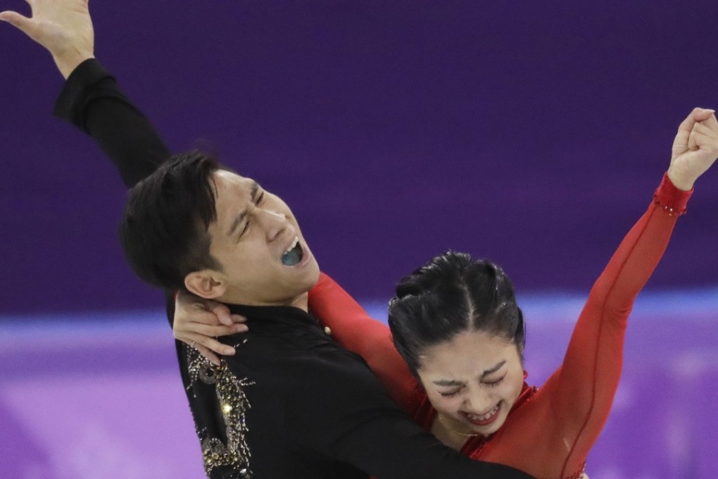 China’s Sui Wenjing (right) and Han Cong after their free skate routine. Photo: AP