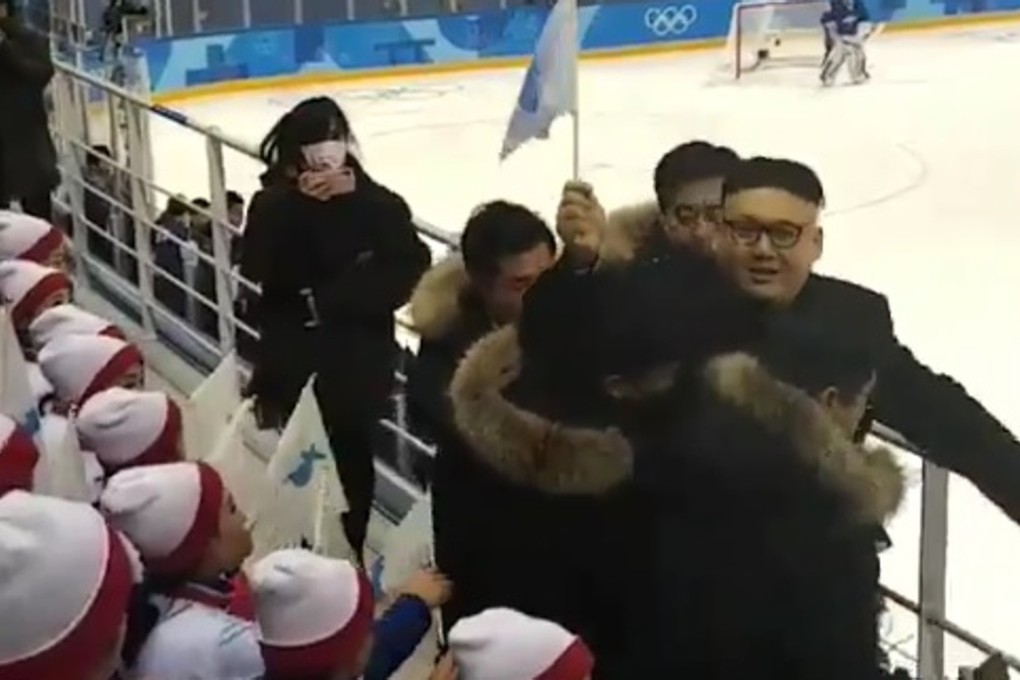 Kim Jong-un impersonator “Howard” is escorted away from North Korea fans. Photo: Twitter