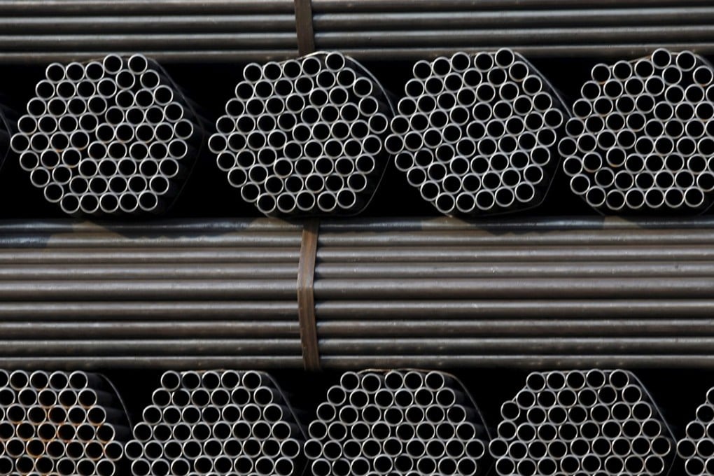 Steel pipe products are piled at the yard of a steel pipe plant in Tangshan in China's Hebei Province in this November 3, 2015 file photo. The US has slapped anti-dumping duties on Chinese pipe fittings. Photo: Reuters
