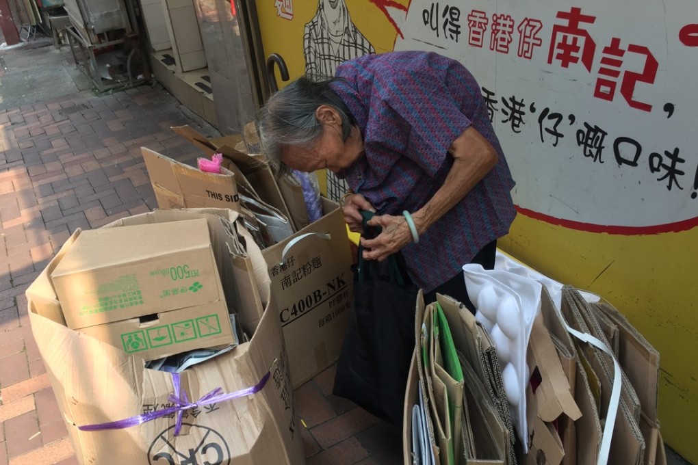 An 89-year-old continues to collect used cardboard in Causeway Bay to make ends meet, as of 16 September, 2017. Photo: SCMP/Denise Tsang