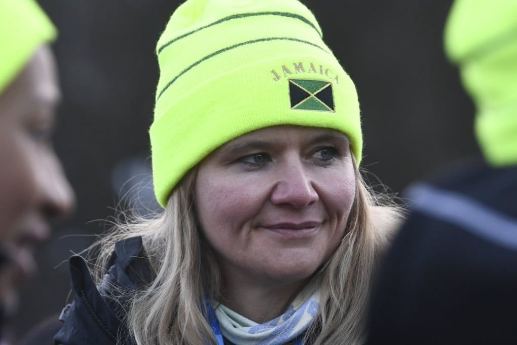 Sandra Kiriasis (centre, on February 7) has quit as the coach of the Jamaican women’s bobsled team. She was described as a ‘hugely destructive force’ by JBSF President Christian Stokes, although Kiriasis herself said that she got on well with the team. Photo: EPA-EFE