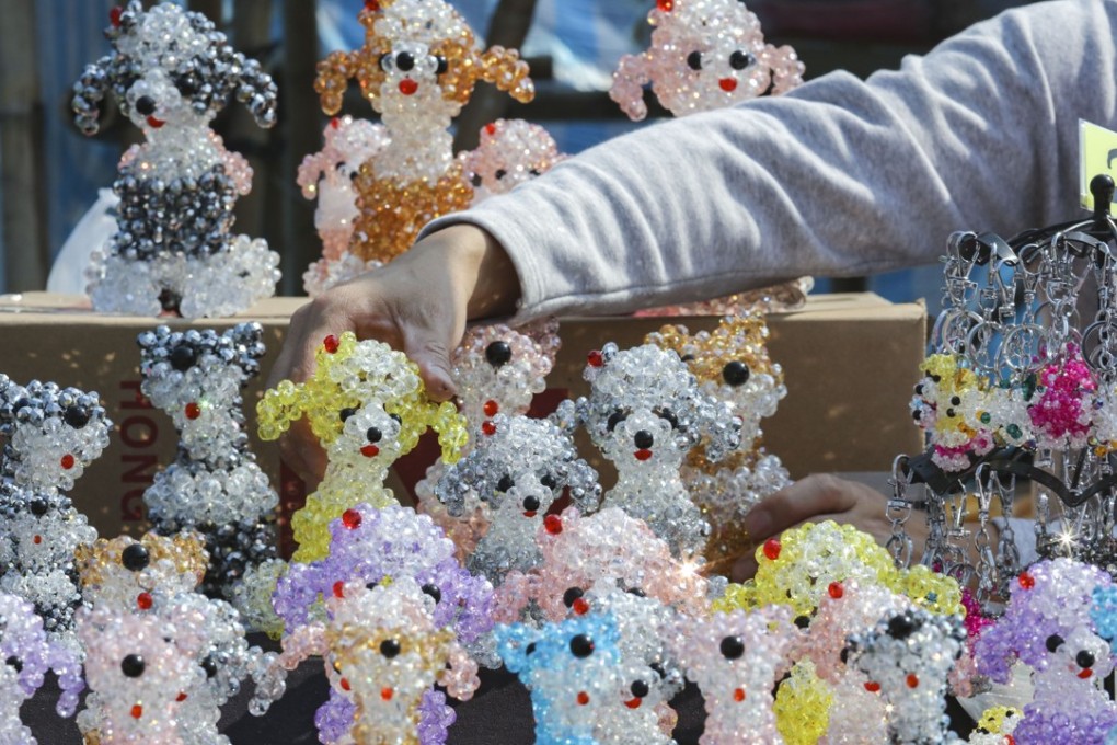 A Lunar New Year market in Hong Kong’s Victoria Park. The Hang Seng Index could test its historical peak level of 33,484 again, which it touched on January 26, in the Year of the Dog. Photo: Felix Wong