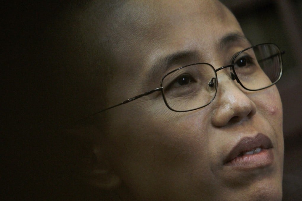 Friends say Liu Xia, the widow of Nobel Peace Prize winner Liu Xiaobo, is cut off from the outside world and barred from making free decisions about who she can contact and where she can go. Photo: AP