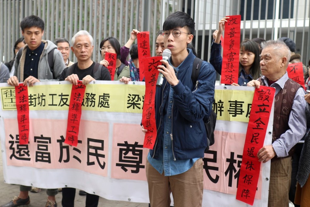 Protesters from the Neighbourhood and Workers Services Centre marches on government headquarters. Photo: Handout