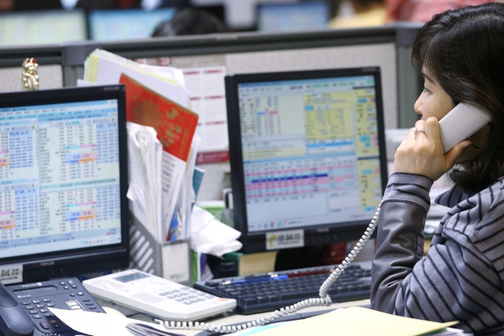 Hong Kong company directors bought more shares in their own companies in the shortened Lunar New Year trading week. Photo: David Wong