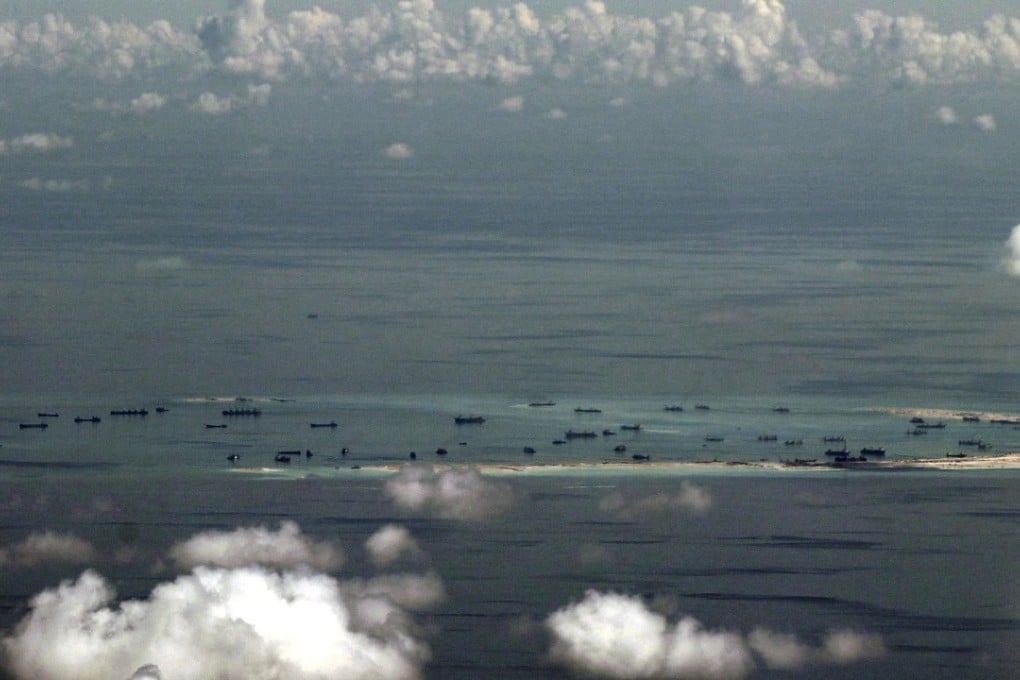An aerial photo from a Philippine military plane showing the alleged ongoing land reclamation by China on Mischief Reef in the Spratly Islands in the South China Sea, west of Palawan, the Philippines. Photo: Reuters