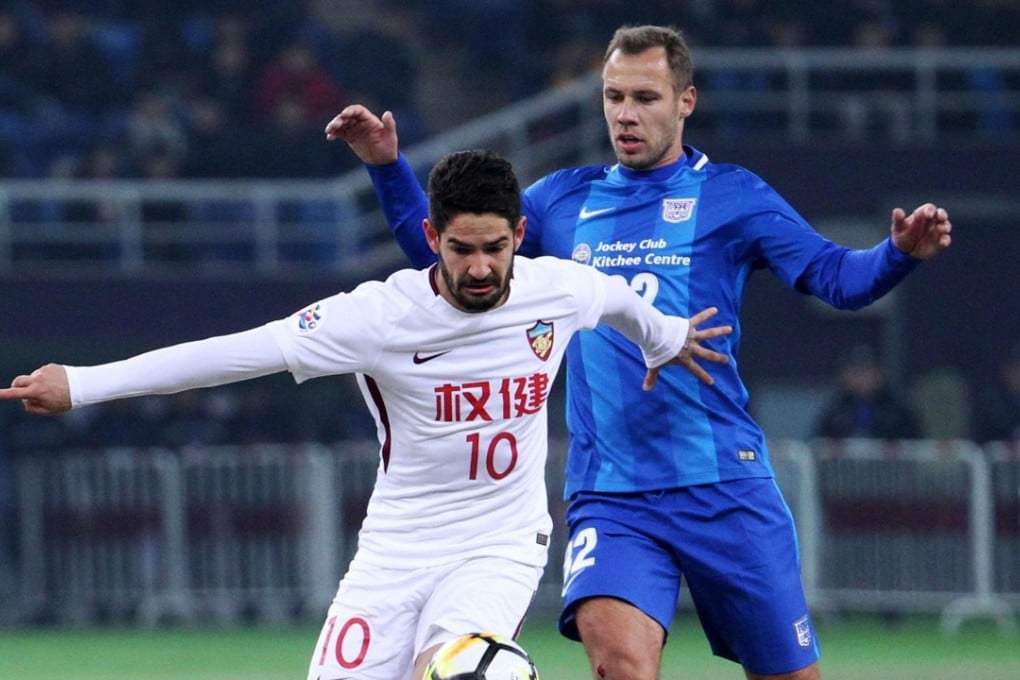 Brazilian star Alexandre Pato of Tianjin Quanjian competes for the ball with Kitchee’s Krisztian Vadocz during their opening AFC Champions League tie last week. Photo: AFP