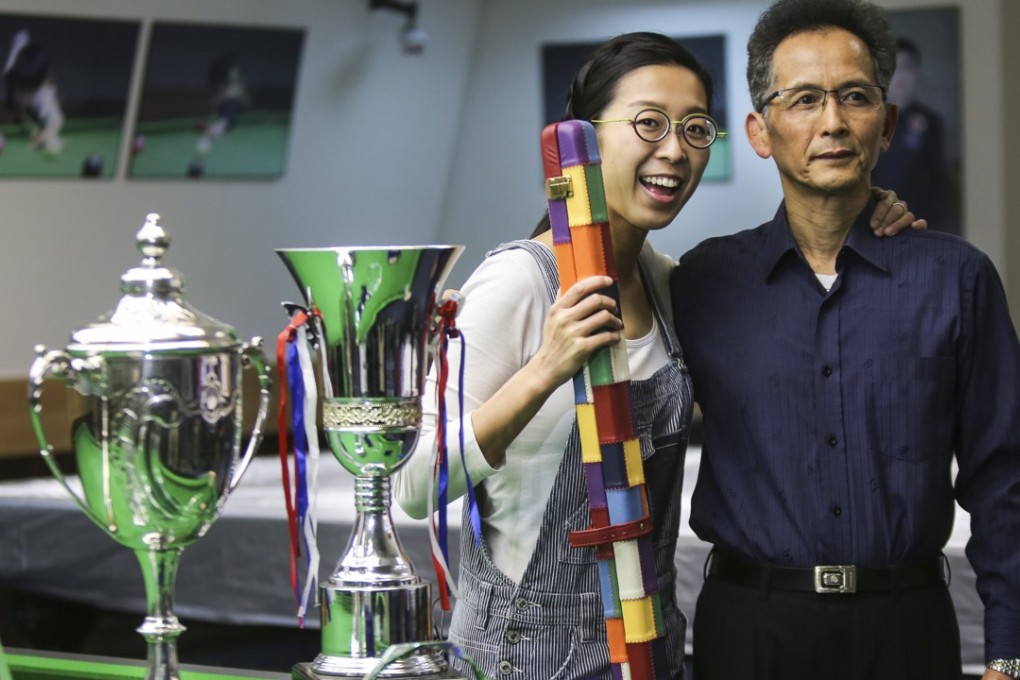 Ng On-yee with her father Ng Yam-shui and her trophies. Photo: Xiaomei Chen