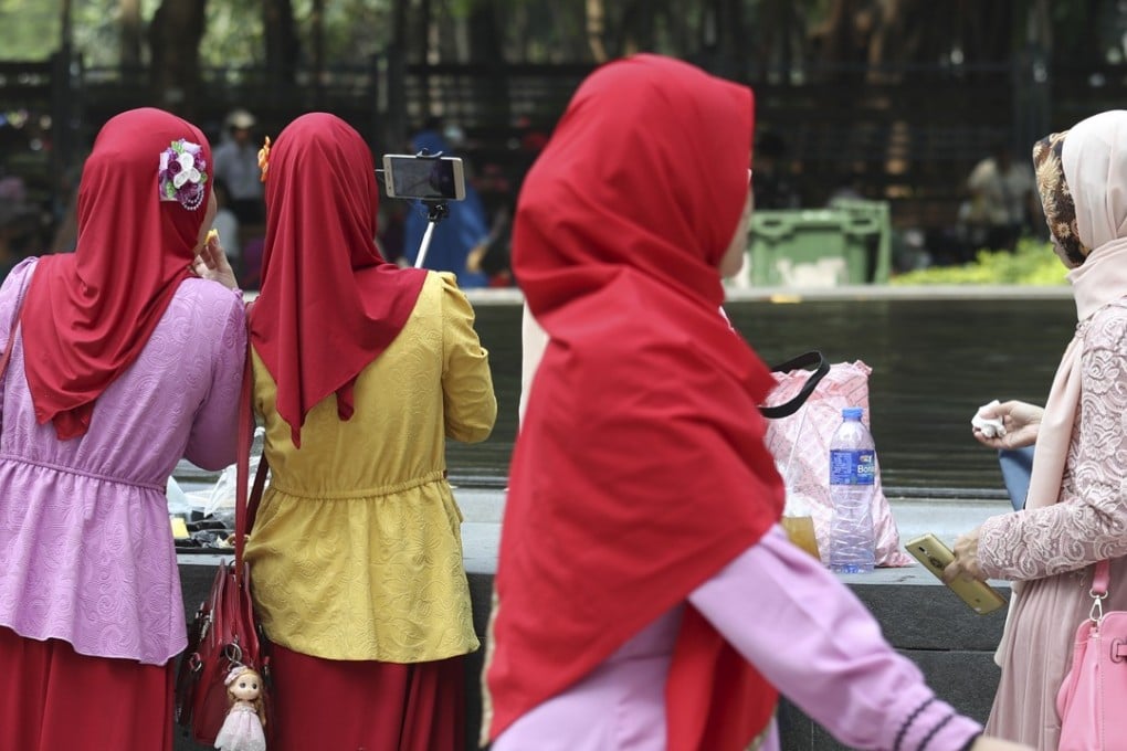 Helpers gather in Causeway Bay’s Victoria Park. Photo: Nora Tam