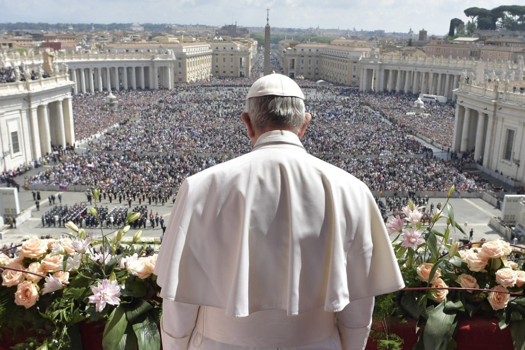 Pope Francis addresses the crowd prior to delivering his Urbi et Orbi (to the city and to the world) message from the main balcony of St. Peter's Basilica, at the Vatican. Photo: AP