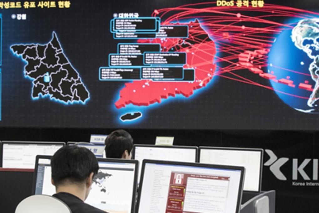 Employees watch electronic boards monitoring possible ransomware cyberattacks at the Korea Internet and Security Agency in Seoul, South Korea. A new report has claimed that North Korea is strengthening its cyberwarfare capabilities for a large-scale attack. Photo: AP