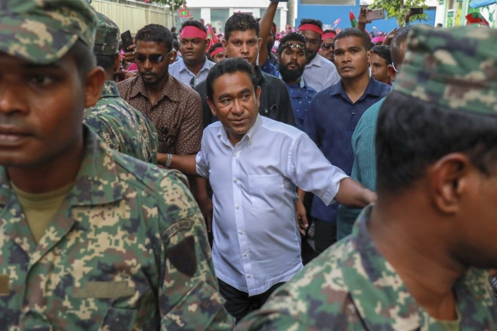 The Maldives president has called for an extension of the country’s state of emergency amid political turmoil. Pictured: President Abdulla Yameen on February 3, surrounded by bodyguards. File photo: AP