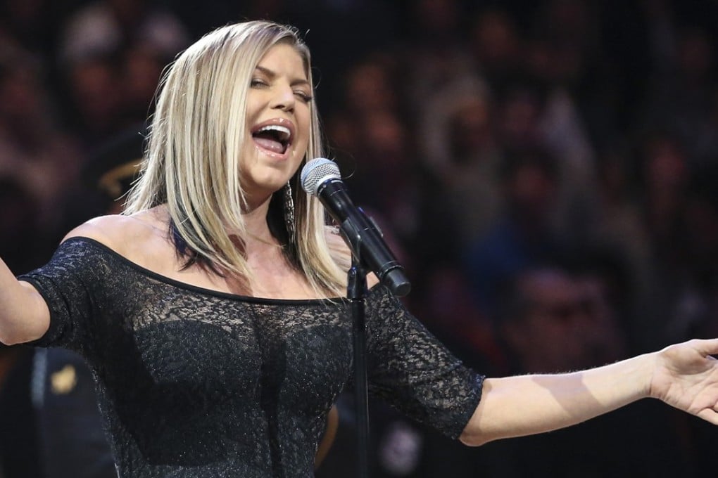 Fergie sings the national anthem before the NBA All-Star Game. Photo: TNS