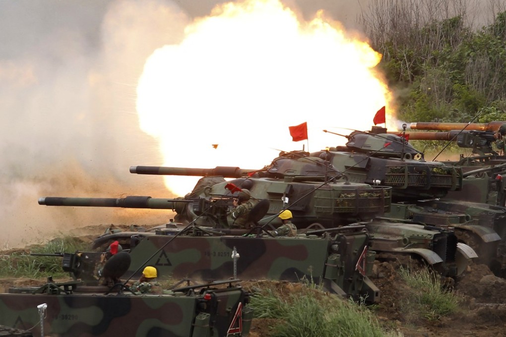 A line of US M60A3 Patton tanks fire at targets during Taiwan’s annual Han Kuang exercises on the outlying Penghu Island last year. Photo: AP