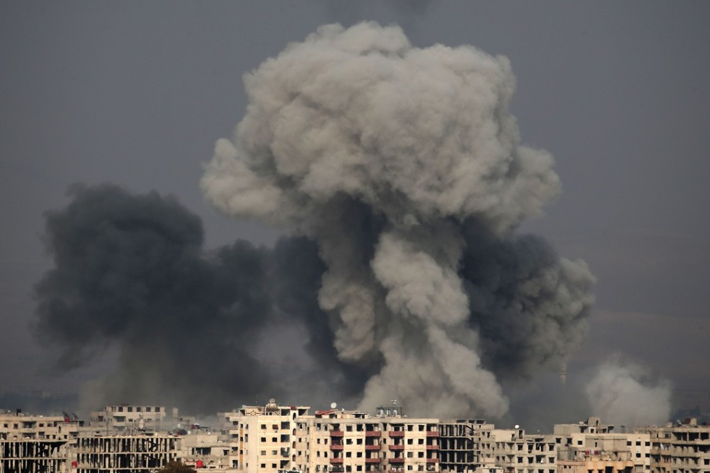 After initially denying that Russian citizens were among the mercenaries killed in an attack on a US-held base last week, the Kremlin has admitted that the fighters were indeed Russians - though they were not there officially, it said. Picture shows a regime air strike on the rebel-held town of Hamouria, Eastern Ghouta. Photo: AFP