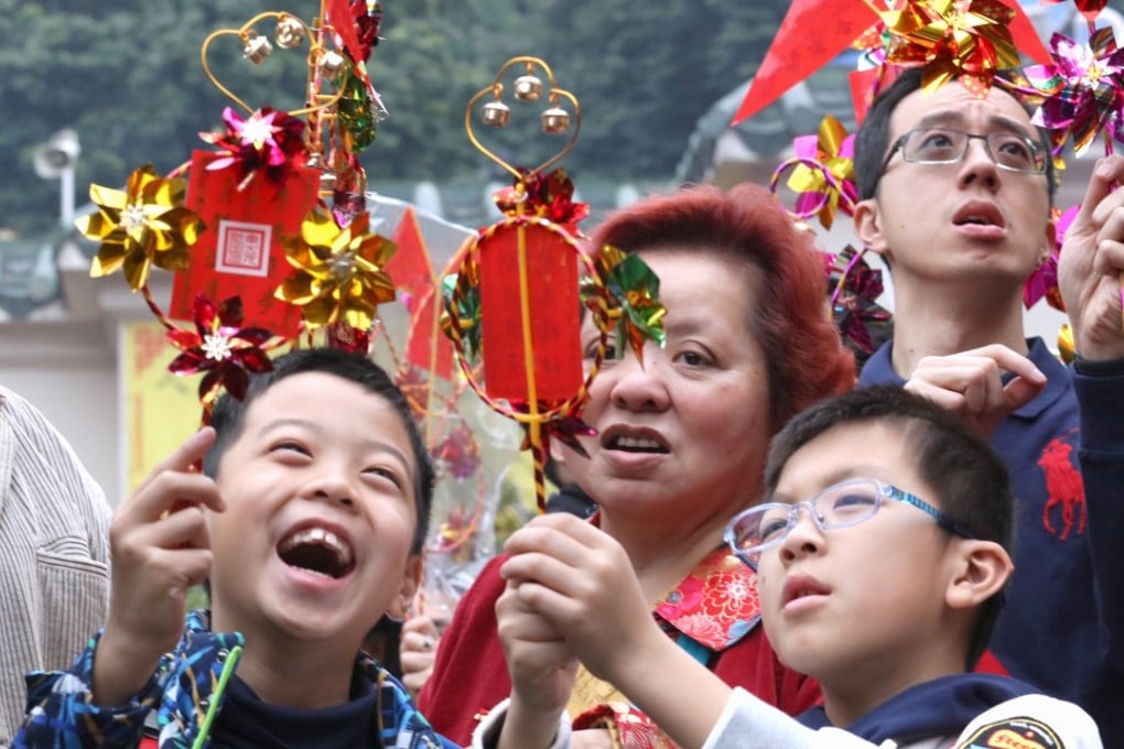 Worshippers visit Che Kung Temple in Sha Tin to pray for good luck and prosperity in the Year of the Dog on the third day of the Lunar New Year. Photo: Felix Wong