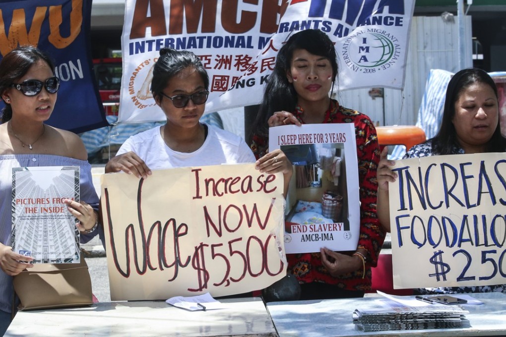 Dmestic workers call for wage increase, working hours regulation, improvement in workers' living and working condition during a campaign in Central. Photo: David Wong