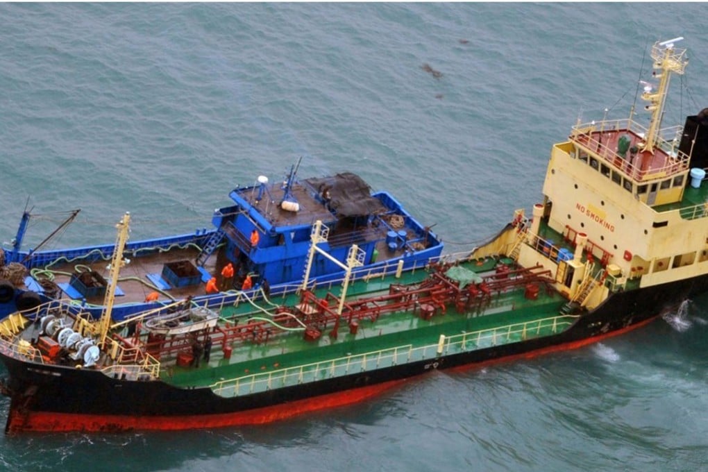 A photo released by Japan’s defence ministry, dated February 16, shows what it says is North Korean-flagged tanker Yu Jong 2 (right) and “Min Ning De You 078” in the East China Sea. Photo: AP