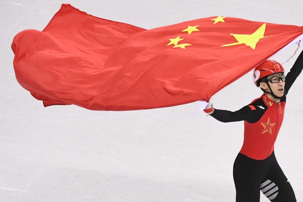 China’s Wu Dajing celebrates victory in the men's 500m short track speed final. Photos: Xinhua