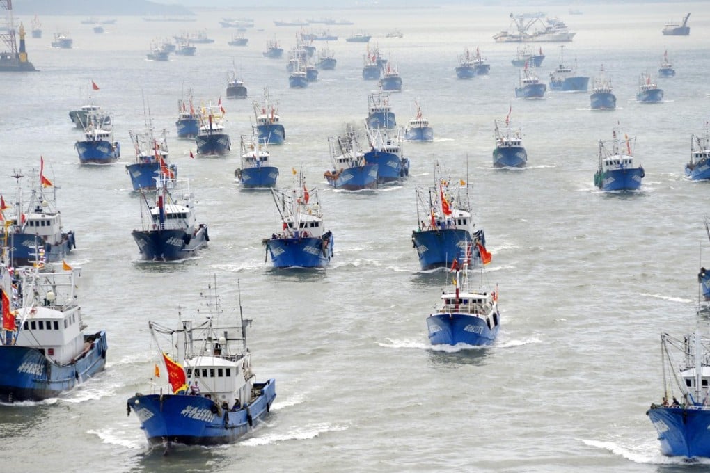 Chinese fishing boats heading out to sea from Zhoushan in Zhejiang province. Photo: China Foto Press