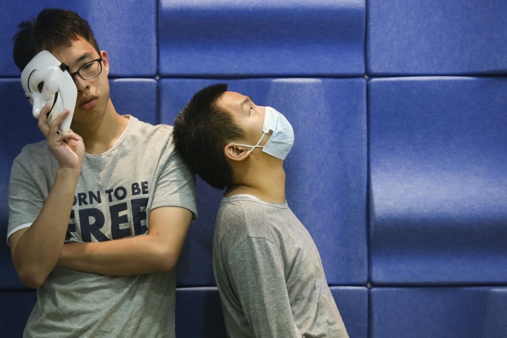 Two of four autistic young men who host a radio programme to raise awareness of autism and combat stereotypes, at North Point on October 31. Photo: David Wong