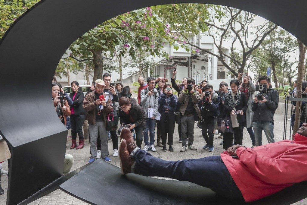 Artist Hank Willis Thomas outside the Hong Kong Arts Centre with his work Ernest and Ruth, 2015, part of the Harbour Arts Sculpture Park unveiled alongside Victoria Harbour. Photo: Jonathan Wong