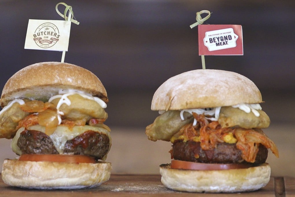 The Wu Tang-style beef burger (left) and the Beyond Wu Tang-style vegan version at The Butchers Club Burger in Wong Chuk Hang, Hong Kong. Photo: Roy Issa