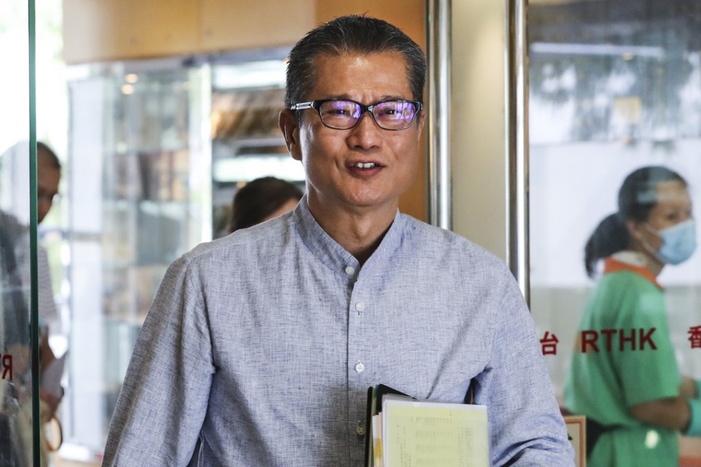 Financial Secretary Paul Chan has run into a growing clamour for cash handouts, prompted by news of a projected record annual surplus approaching HK$160 billion. Photo: Edward Wong