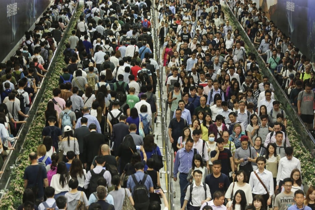 People head home between Hong Kong and Central MTR stations. Photo: Dickson Lee