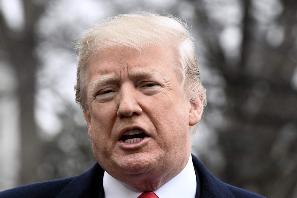 US President Donald Trump takes questions from the media as he departs the South Lawn of the White House in Washington his way to that annual Conservative Political Action Conference (CPAC) on Friday. Photo: AFP