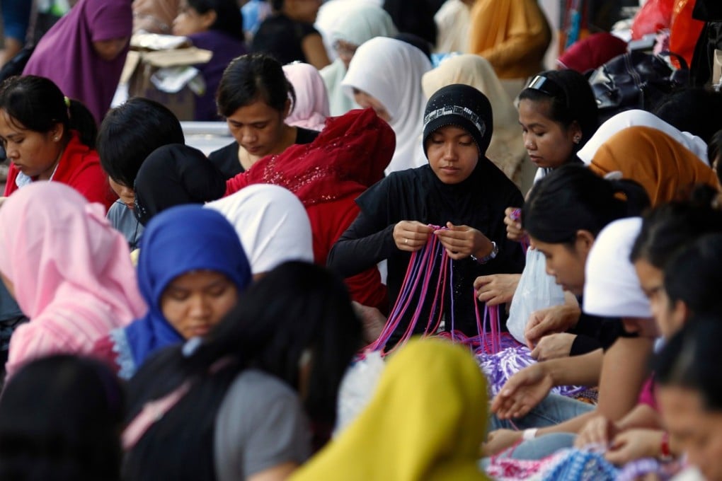 There are about 250,000 domestic workers in Malaysia, mostly from Indonesia and the Philippines. Hong Kong has about 370,000. Photo: AFP