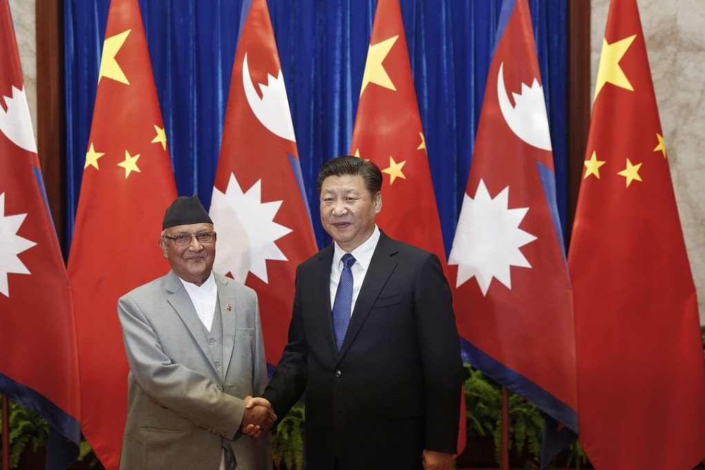 President Xi Jinping and new Nepalese Prime Minister Khadga Prasad Sharma Oli. Photo: AFP