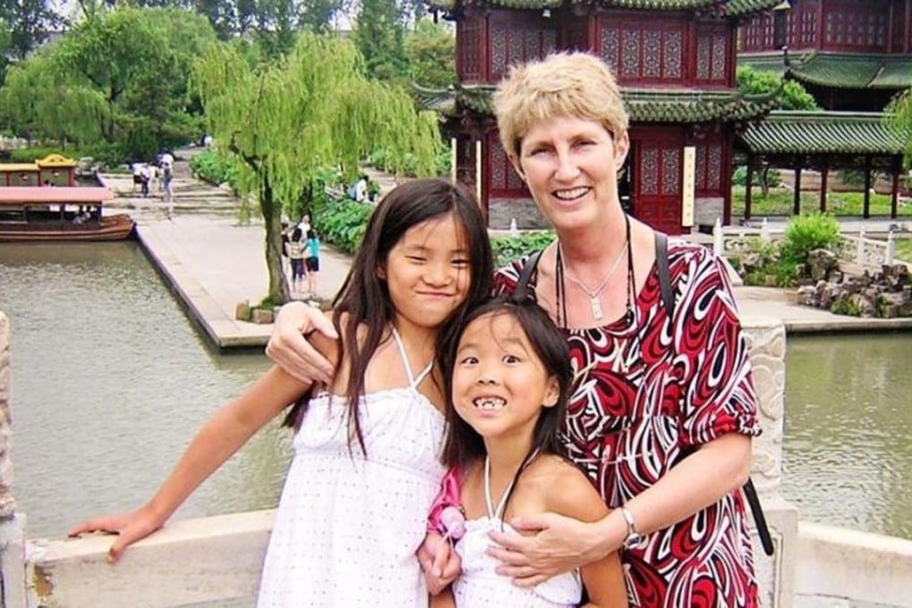 Patti Waldmeir with her daughters Grace (left) and Lucy.