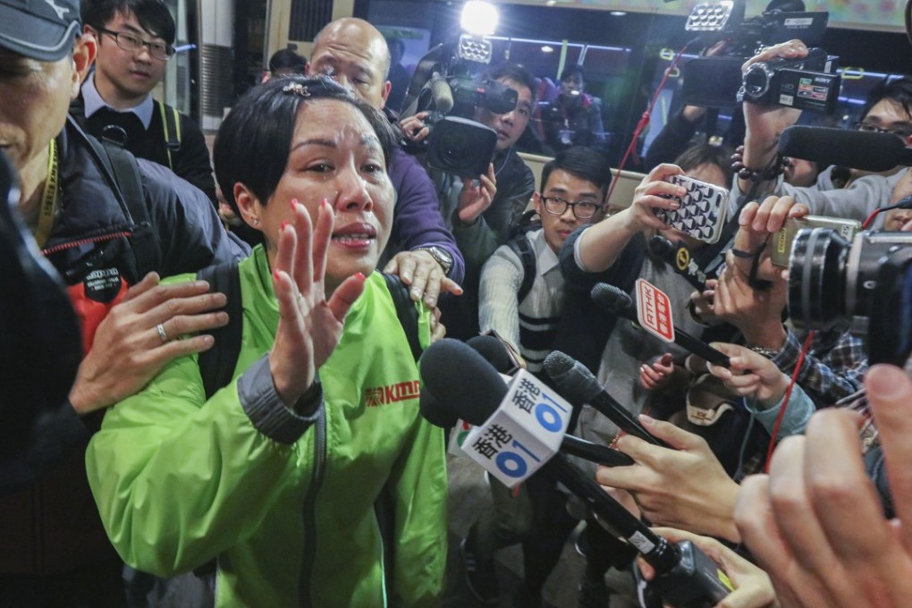 KMB bus driver Yip Wai-lam sheds tears while speaking to the media during the strike at a terminus. Photo: Felix Wong