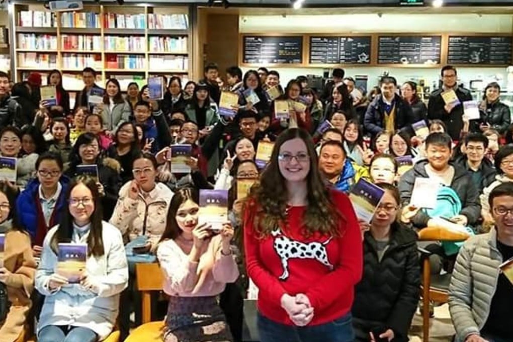 Scottish author Claire McFall attends a book signing in Beijing.
