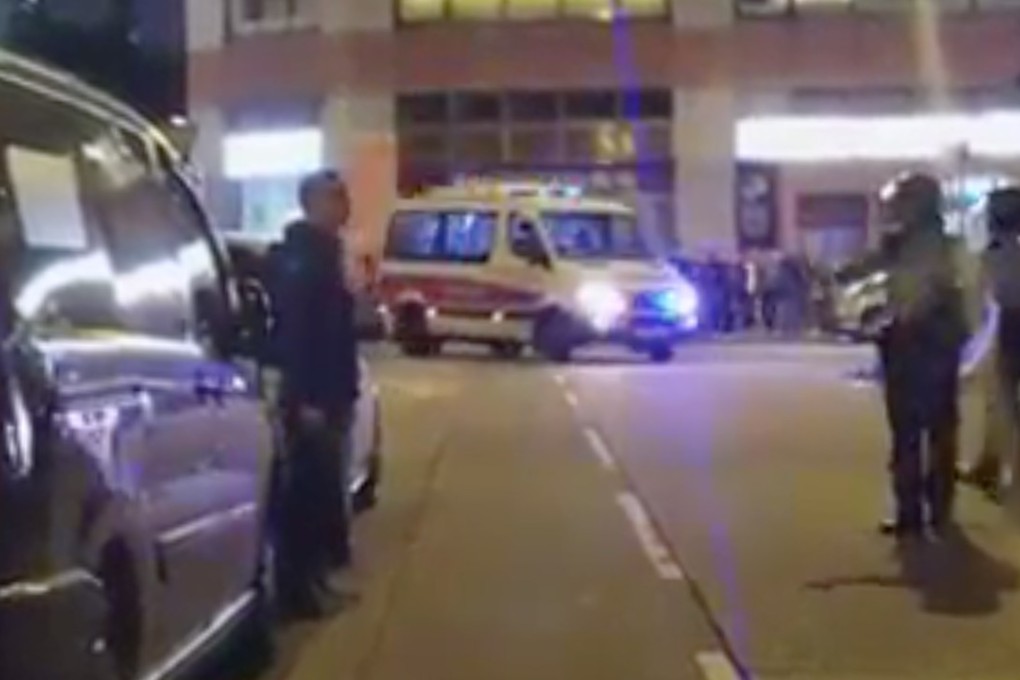 A screen capture of a video showing the knife-wielding man in a stand-off with police. Source: Facebook