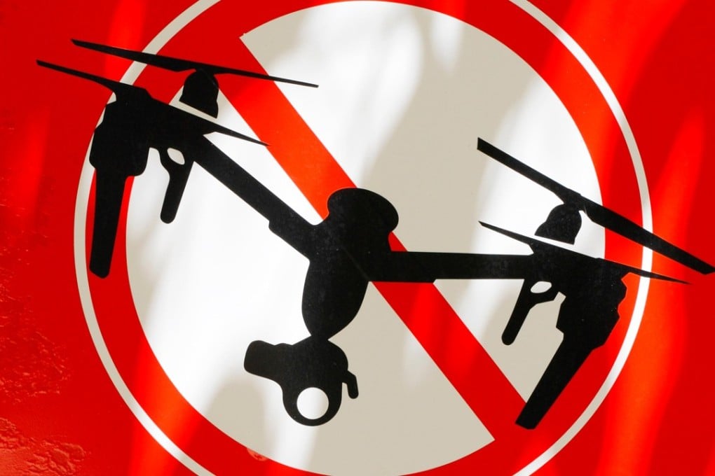 A sign signalling a restricted drone area in Tulum, Mexico, a town known for its beaches and the ruins of an ancient Mayan port city. Photo: Alamy