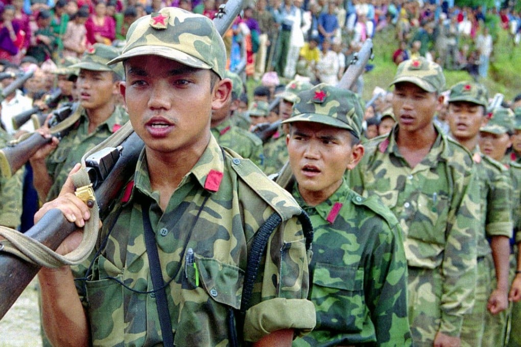 Young Nepalese Maoist rebels take part in a ceremony in May, 2001. Photo: Reuters