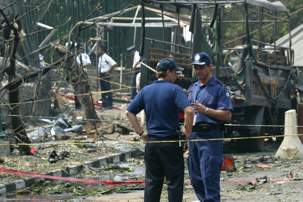 Australian Federal Police outside the Australian Embassy in Jakarta after a bomb attack in 2004 that killed nine people and wounded 173. Photo: AP