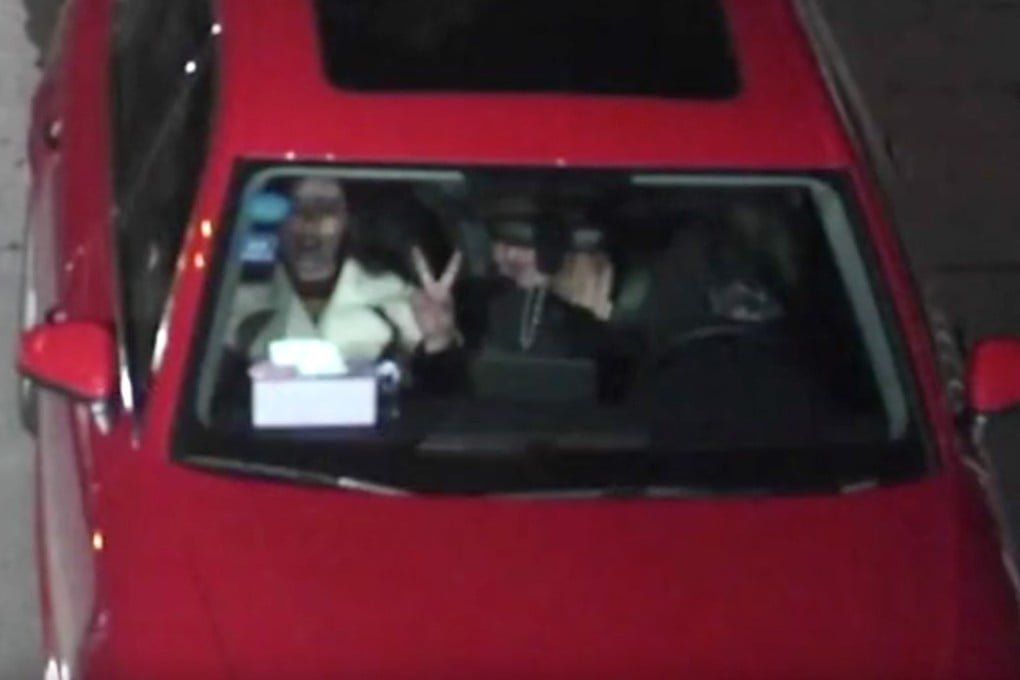 A suspected drink-driver was caught on camera making a V for Victory sign just moments before his car was involved in a crash with another vehicle in eastern China. Photo: QQ.com