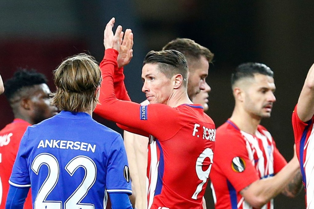 Atletico Madrid players celebrate after beating FC Copenhagen in the Uefa Europa League. Photo: AFP