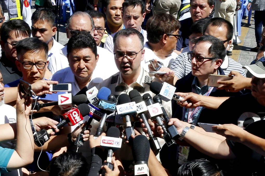 Philippine Foreign Affairs Secretary Alan Peter Cayetano (centre). Photo: AP
