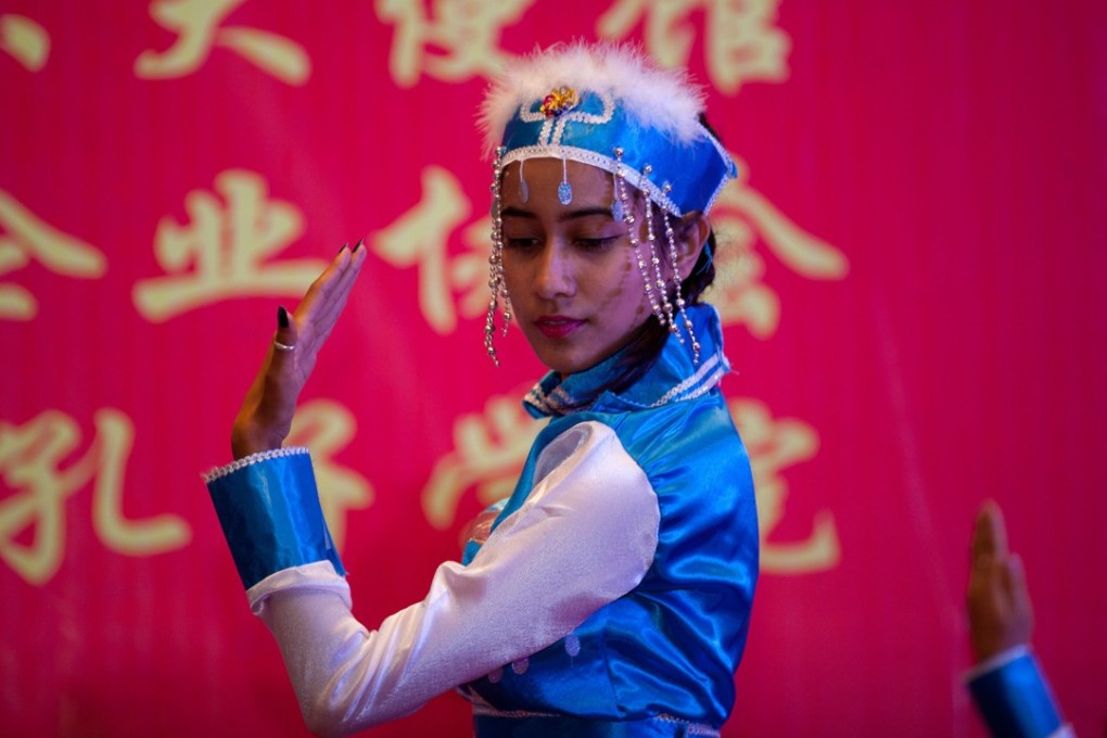 Nepalese students dance at an event co-organised by the Chinese embassy in Nepal to celebrate the Lunar New Year, on February 10 in Kathmandu. Photo: Xinhua